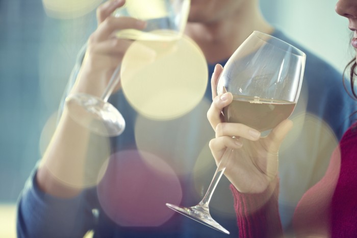 Close-up of woman drinking white wine