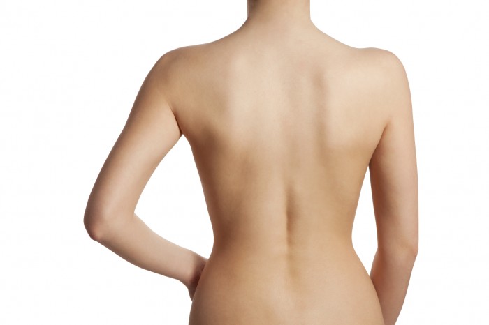 Beautiful and naked female back view