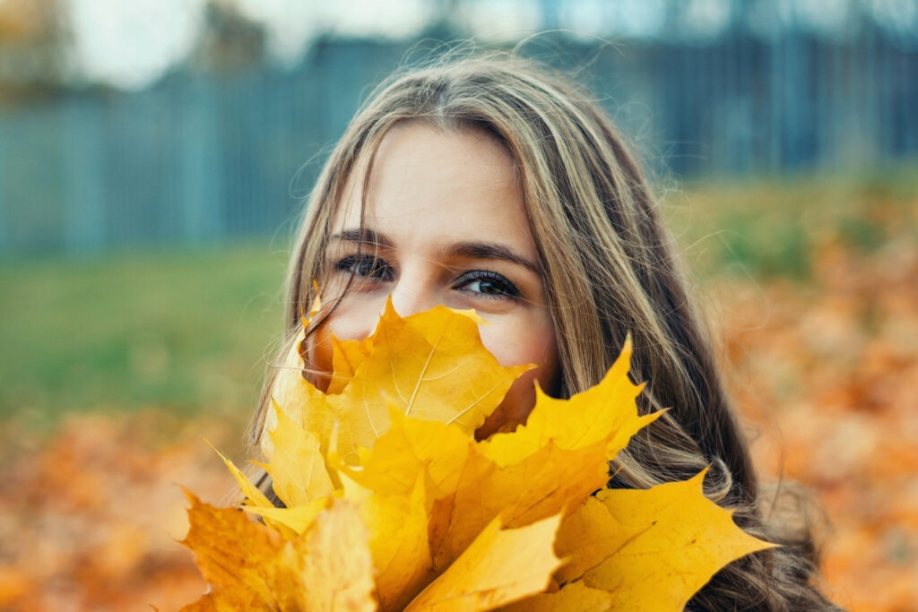 beautiful young girl in autumn Park