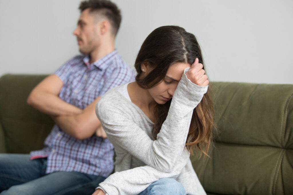 Frustrated woman feeling sad after fight with stubborn selfish husband