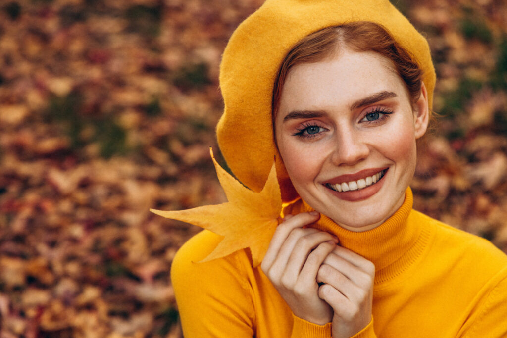 Beautiful woman enjoying autumn