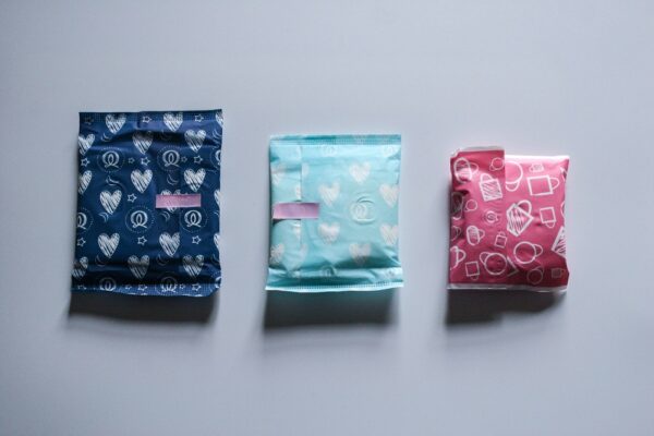Sanitary towels in coloured wraps