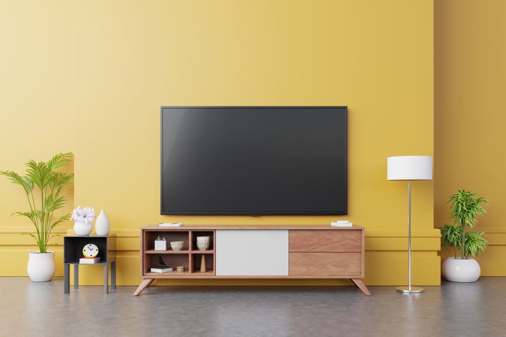 Tv,On,Cabinet,In,Modern,Living,Room,With,Lamp,table,flower,And