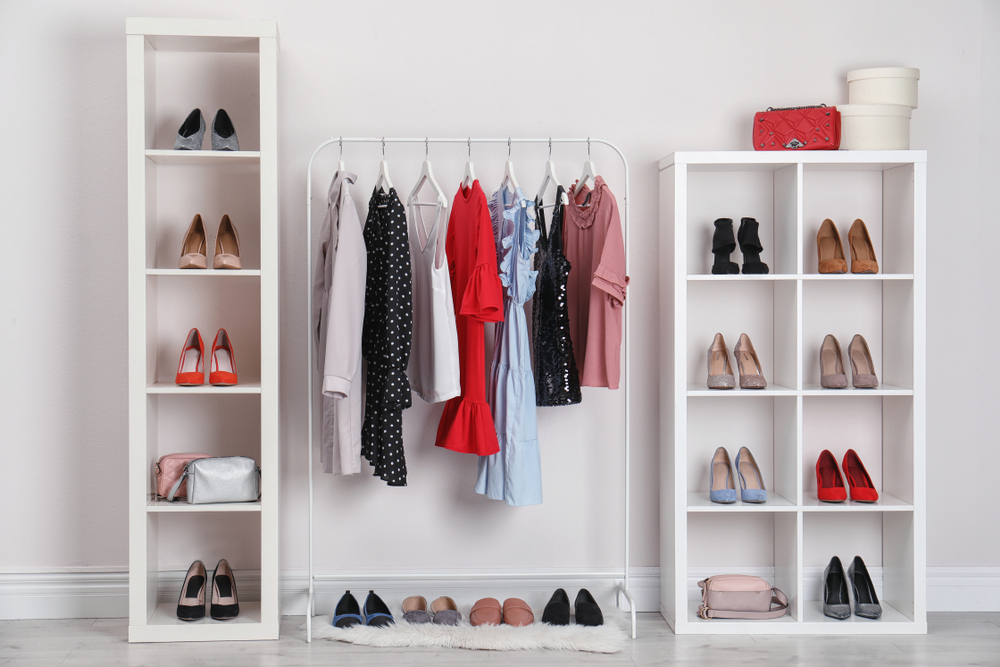 Wardrobe,Shelves,With,Different,Stylish,Shoes,And,Clothes,Indoors.,Idea