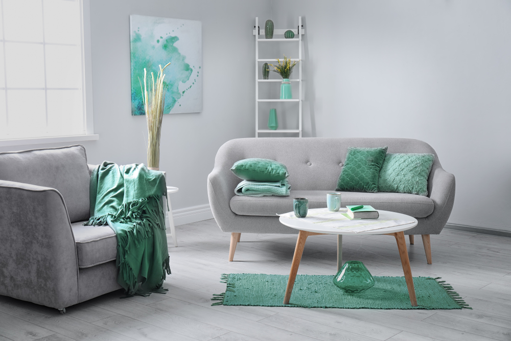 Living,Room,Interior,With,Comfortable,Armchair,And,Sofa.,Mint,Color