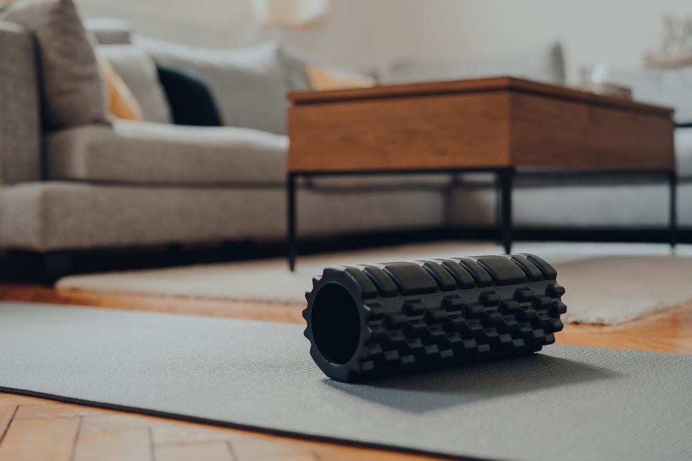Close,Up,Of,A,Black,Foam,Roller,On,A,Fitness